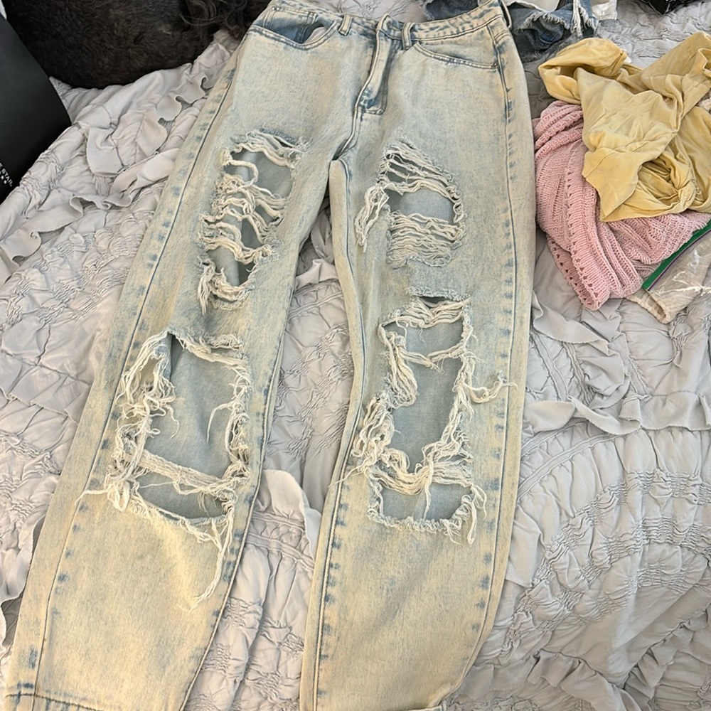 Light-wash ripped jeans